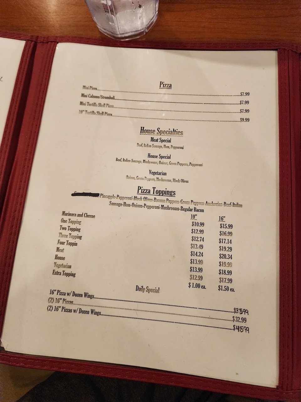 Menu page showing calzones and subs.